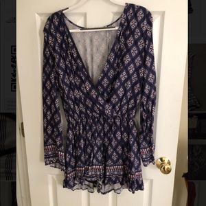 Honey Belle long sleeved blue romper. Size M/L.
